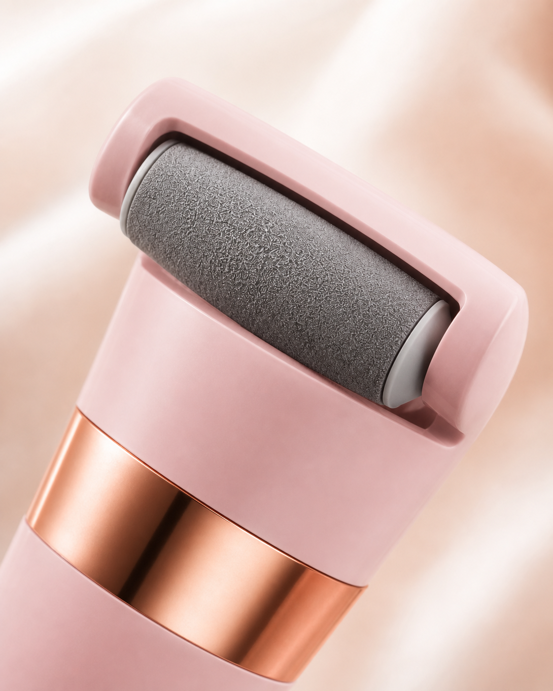 Close-up of the gray mineral roller on the pink Pediore callus remover
