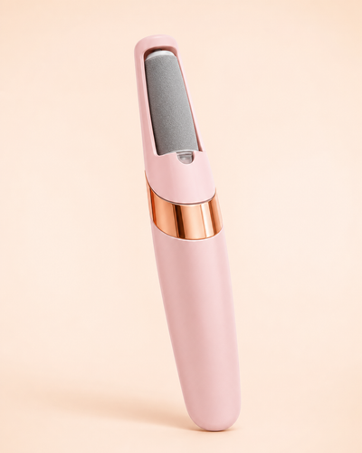 Pink Pediore electric callus remover on an ivory studio background